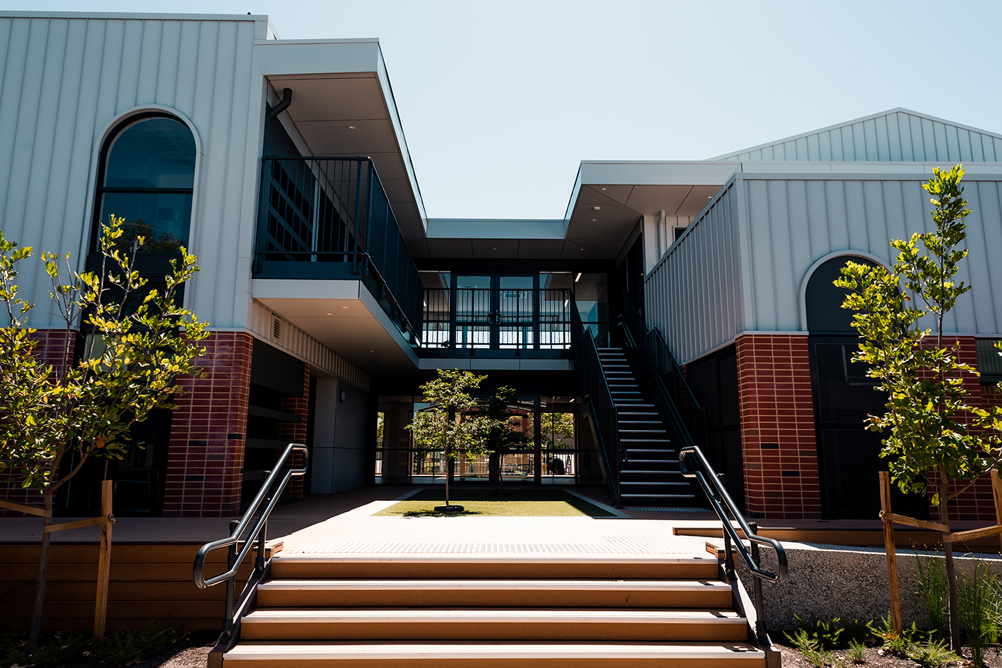 Photo of front of modern school building