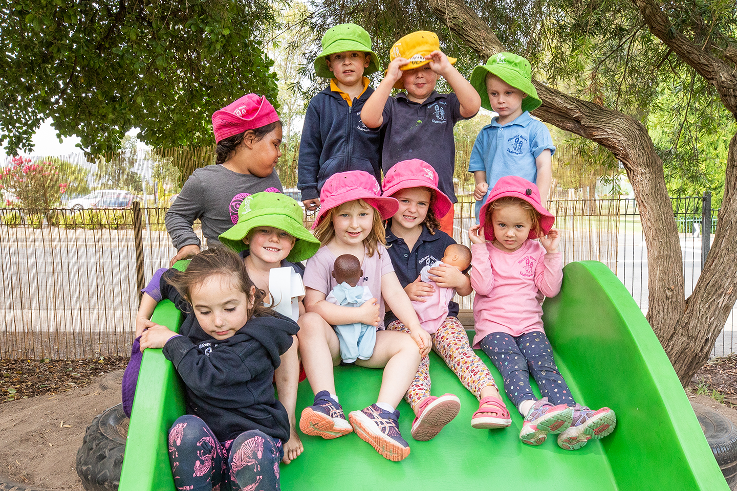 Photo of kindy students on slide