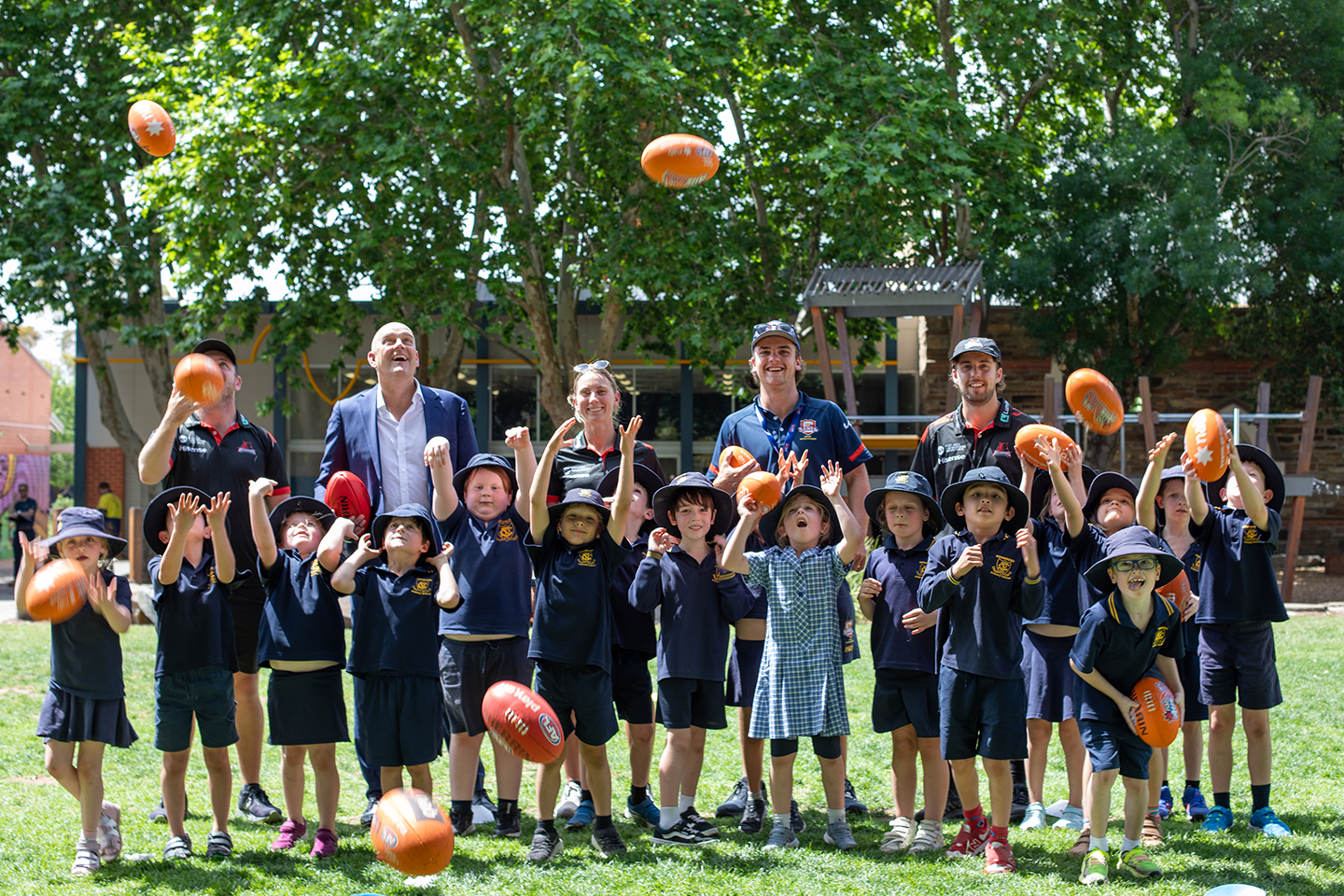 Photo of Goodwood Primary School students with SANFL team