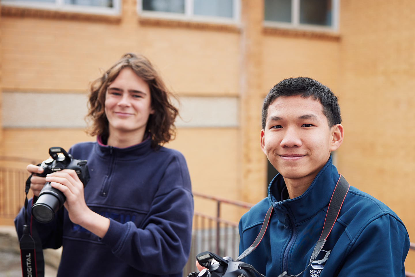 Photo of two students learning photography