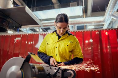 Student welding at new technical college