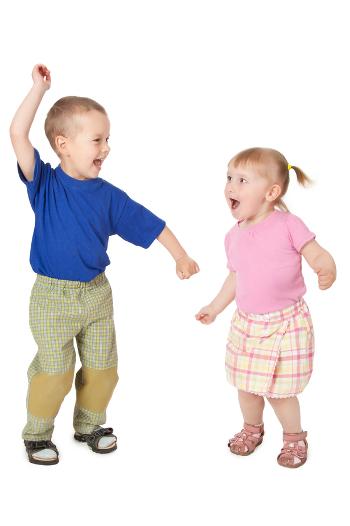 A boy and a girl dancing