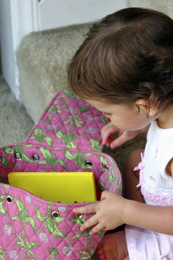 Young girl packing her bag